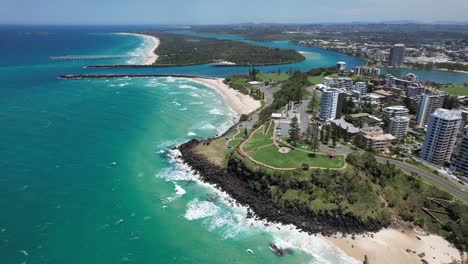 aerial view of coastal city with beach and ocean