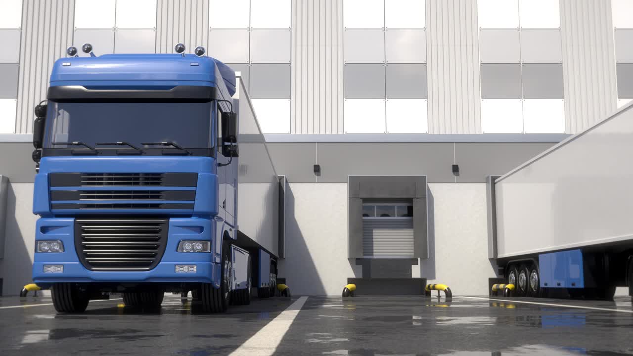 창고 로딩 도크에 있는 반 트럭