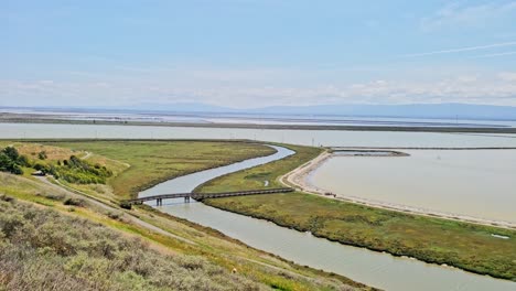 panning view of coyote hills wetlands in newark california some clouds and blue skies