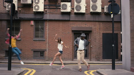 Group-of-multi-racial-dancers-street-dancing-funky-freestyle-in-the-city