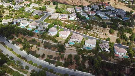aerial top down of luxury villas in hidden hills in calabasas with private pool. small american town near los angeles, california. sunny summer evening in usa.