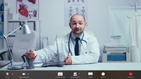 practitioner doctor offering medical online advice from his office