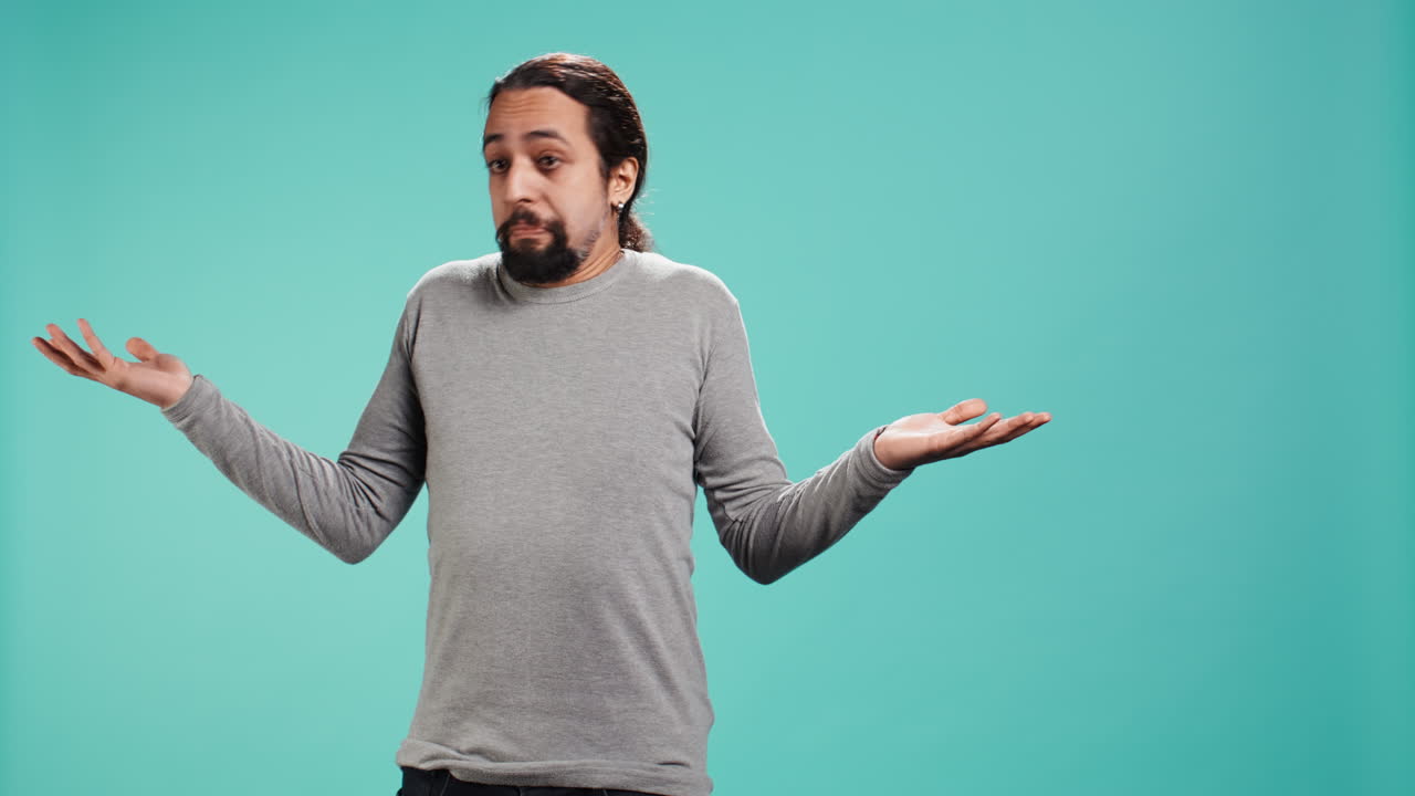 Man shrugging shoulders, unable to provide answer