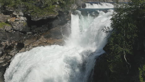 enormous-and-powerful-Gaustafallet-waterfall-in-river-Gauste,-Jamtland,-Sweden