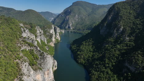 flight above lake between cliff