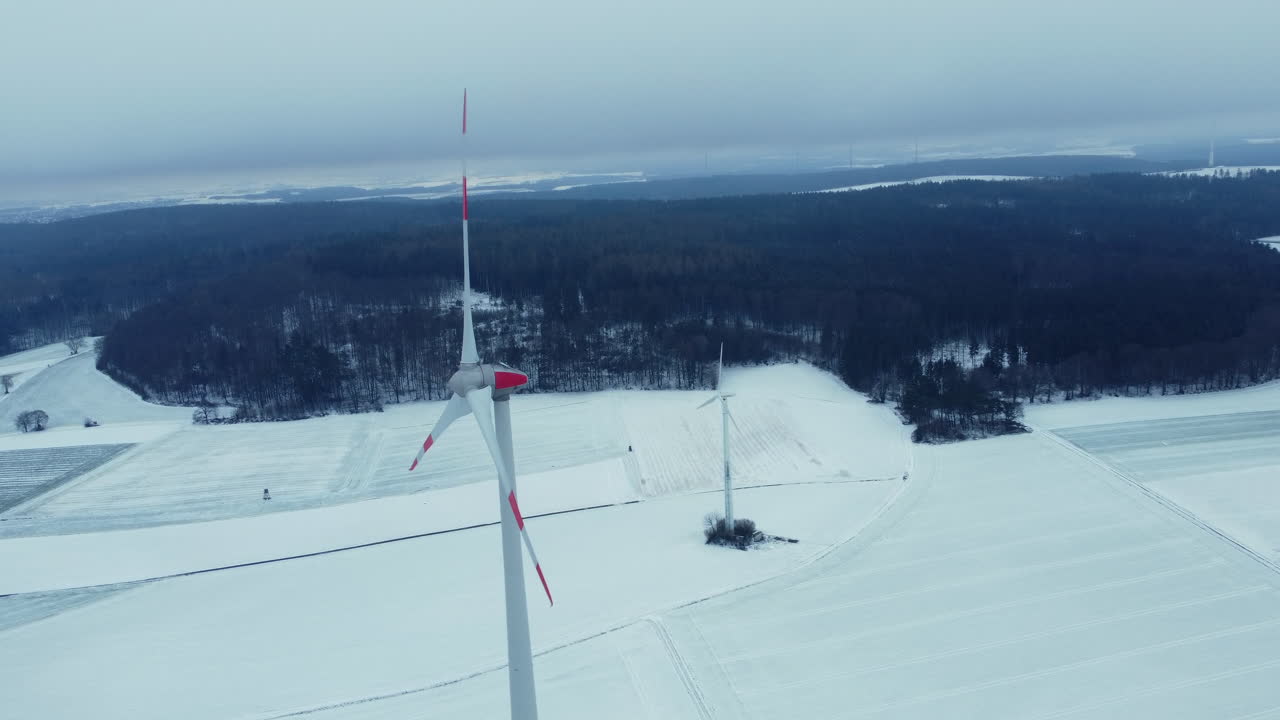 Snowy Winter Landscape with Wind Turbines
