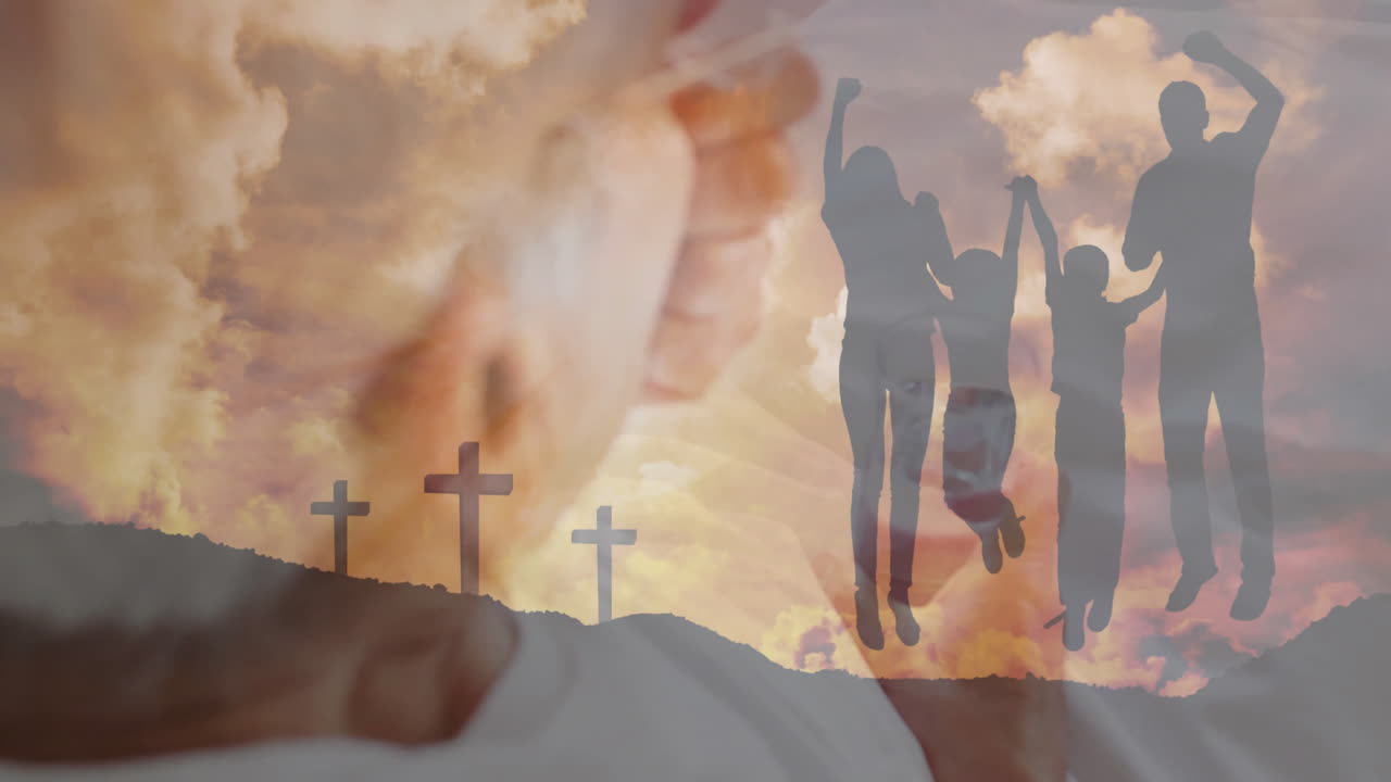 Jumping silhouettes of family with sunset sky and crosses animation in background