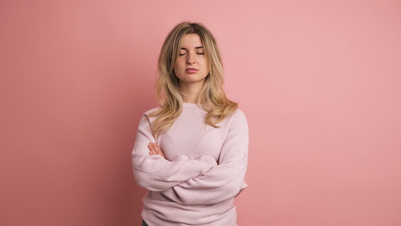 Blonde adult woman expressing negativity with head