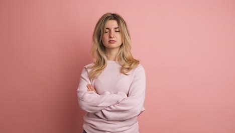 blonde adult woman expressing negativity with head