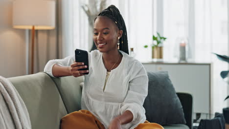 Home,-credit-card-and-black-woman-on-a-couch