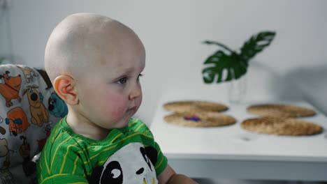 little boy with a hair clipper. family haircut, hygiene, beauty and selfcare at home.