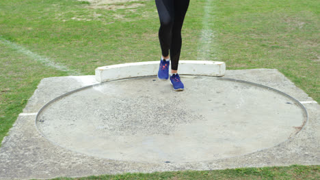 low section of female athlete standing on sports venue 4k