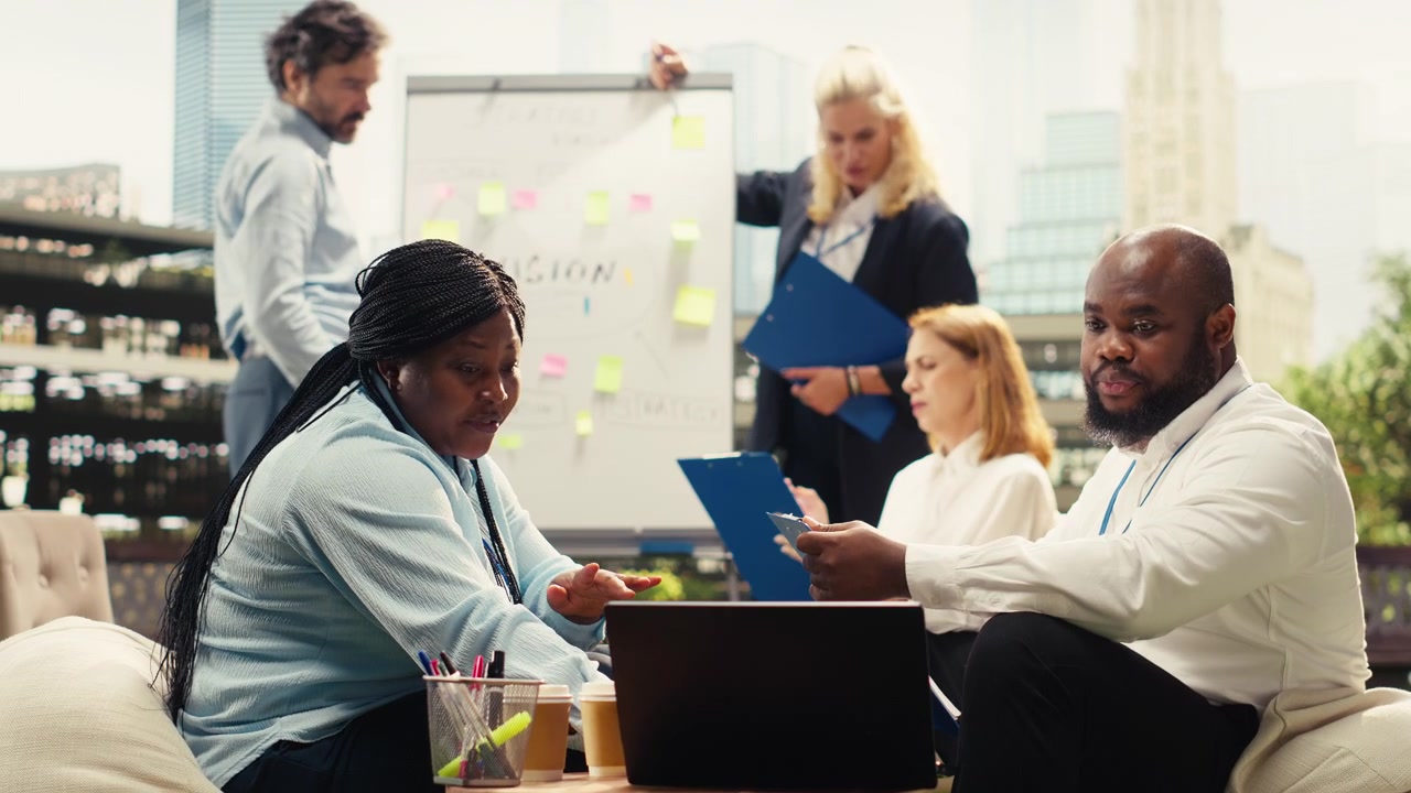 Diverse Business Team Collaborating in Modern Office Meeting