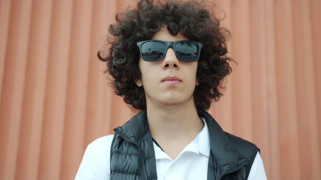 Teenage boy wearing sunglasses