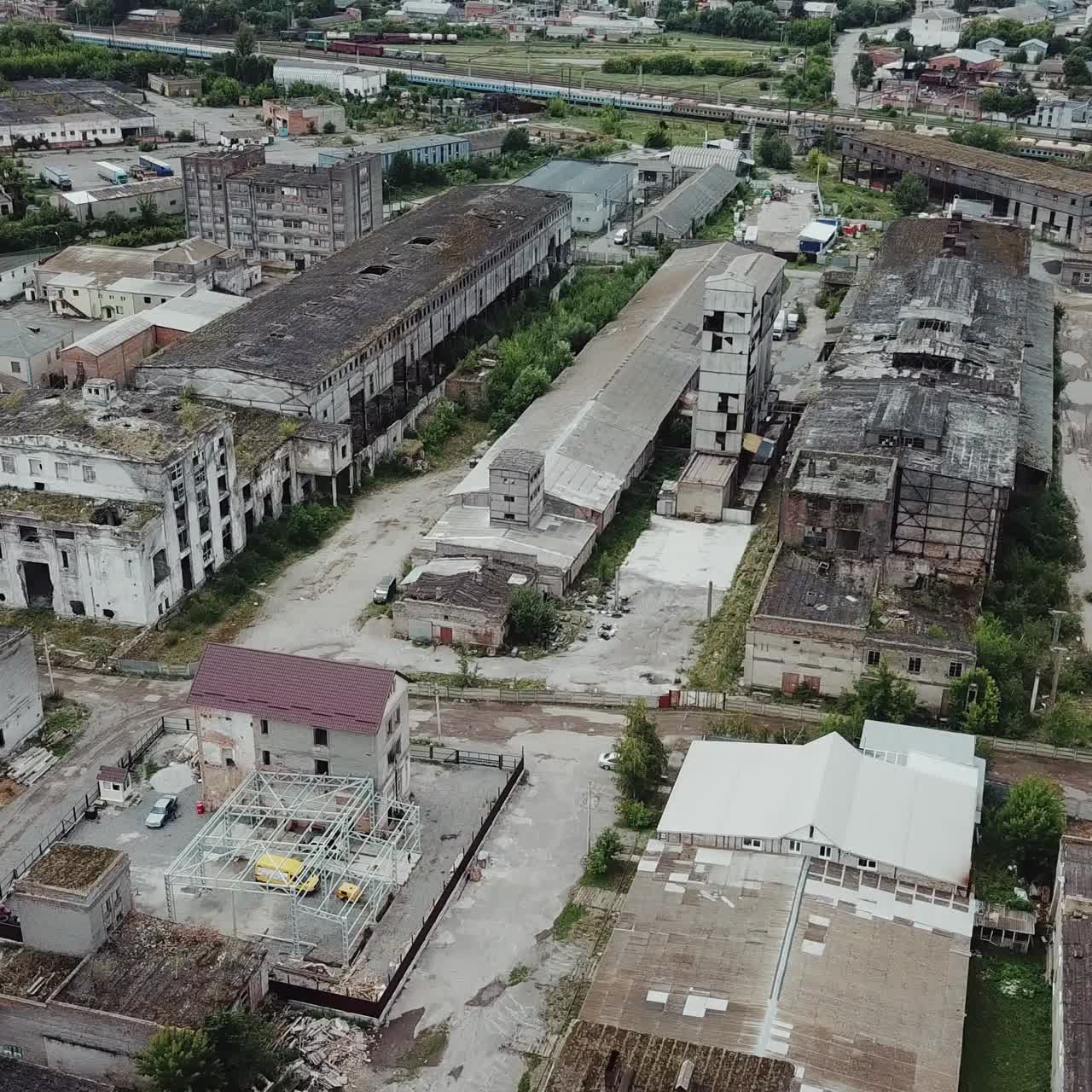 Aerial view of an abandoned industrial plant. Factory ruins.
