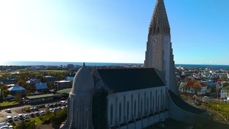 aerial establishing shot of the famous hallgrimskirkja church in reykjavik