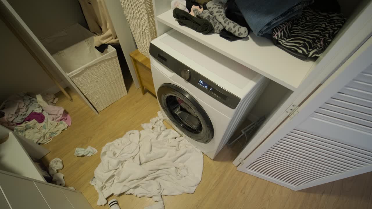 Modern Washing Machine Cleaning Clothes in a Domestic Setting