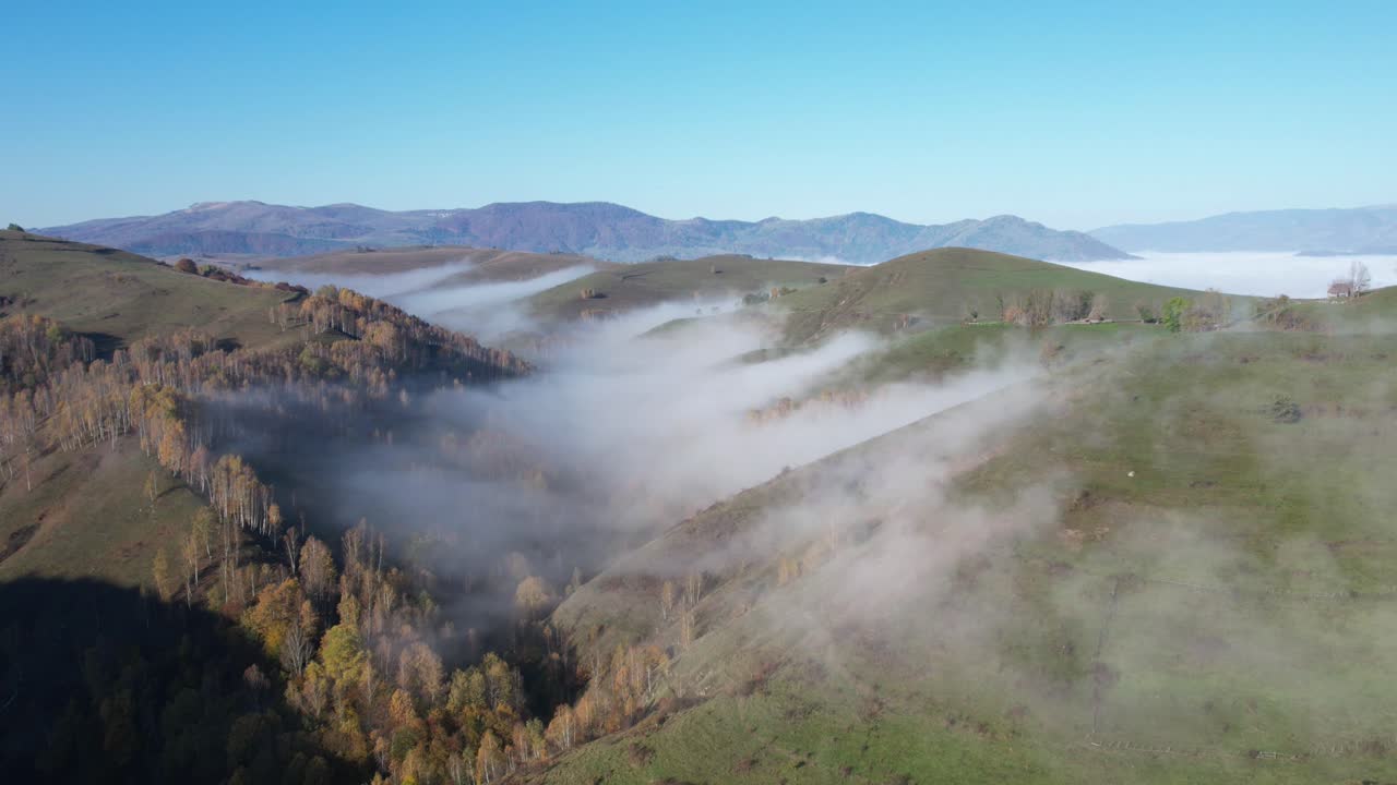 Foggy valley hyperlapse drone aerial 4k video in autumn rural Romanian countryside landscape Dumesti