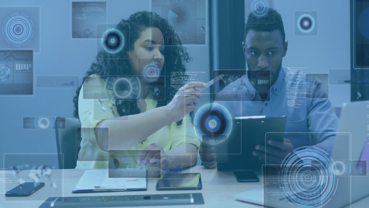 Collaborating with digital interface holograms, diverse colleagues in modern office