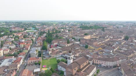 Aerial-establishing-shot-across-northern-Italy-town-of-Crema