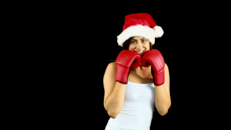 Festive-brunette-boxing-to-camera