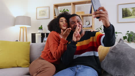 selfie, home couch and couple with happiness