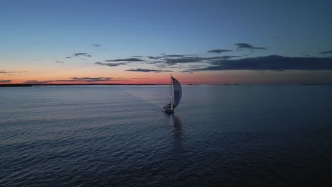 A-sailing-yacht-is-sailing-on-the-calm-Baltic-Sea-with-a-gennaker-sail