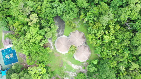 Cinematic-spinning-top-down-aerial-bird's-eye-view-of-park-shelter