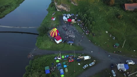 aerial view of a festival near a river