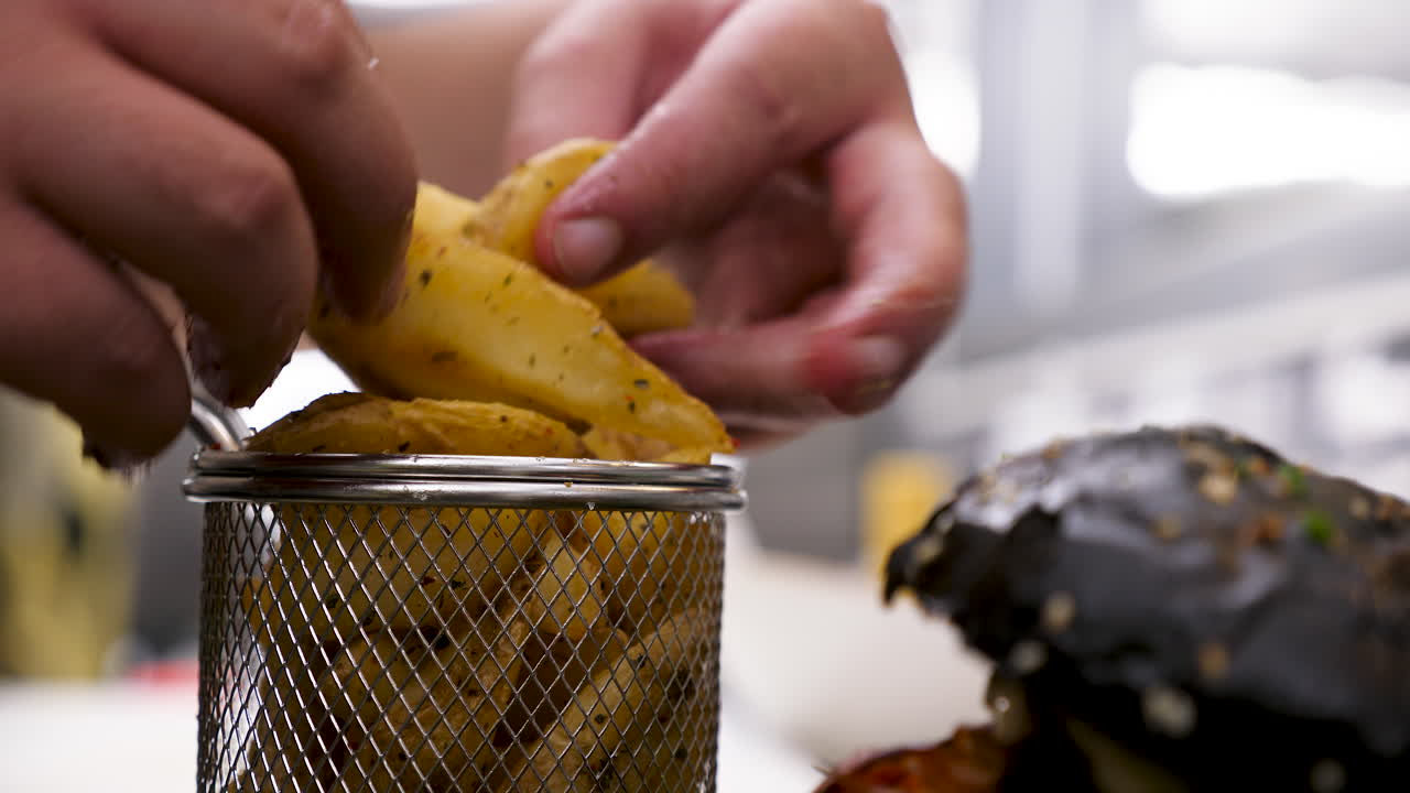 Preparing food with fries and burger