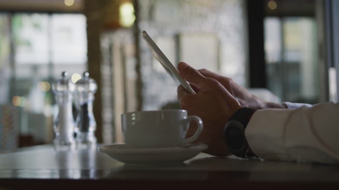 Young professional man in a cafe