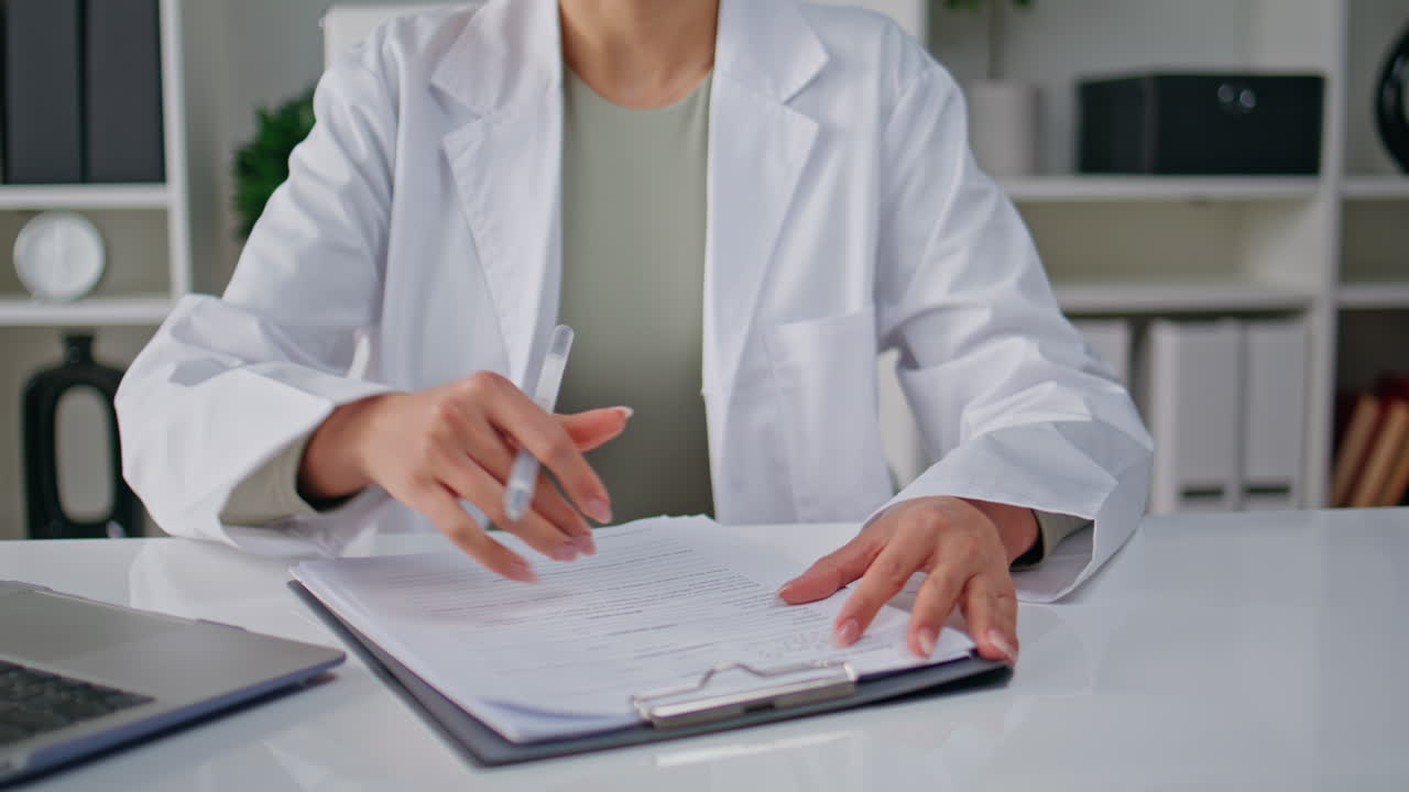 Doctor hands gesturing online consultation by laptop closeup. Medic video call