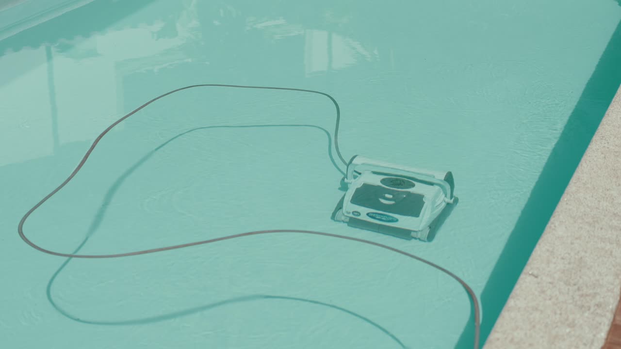 Efficient pool cleaner glides smoothly in crystal clear water