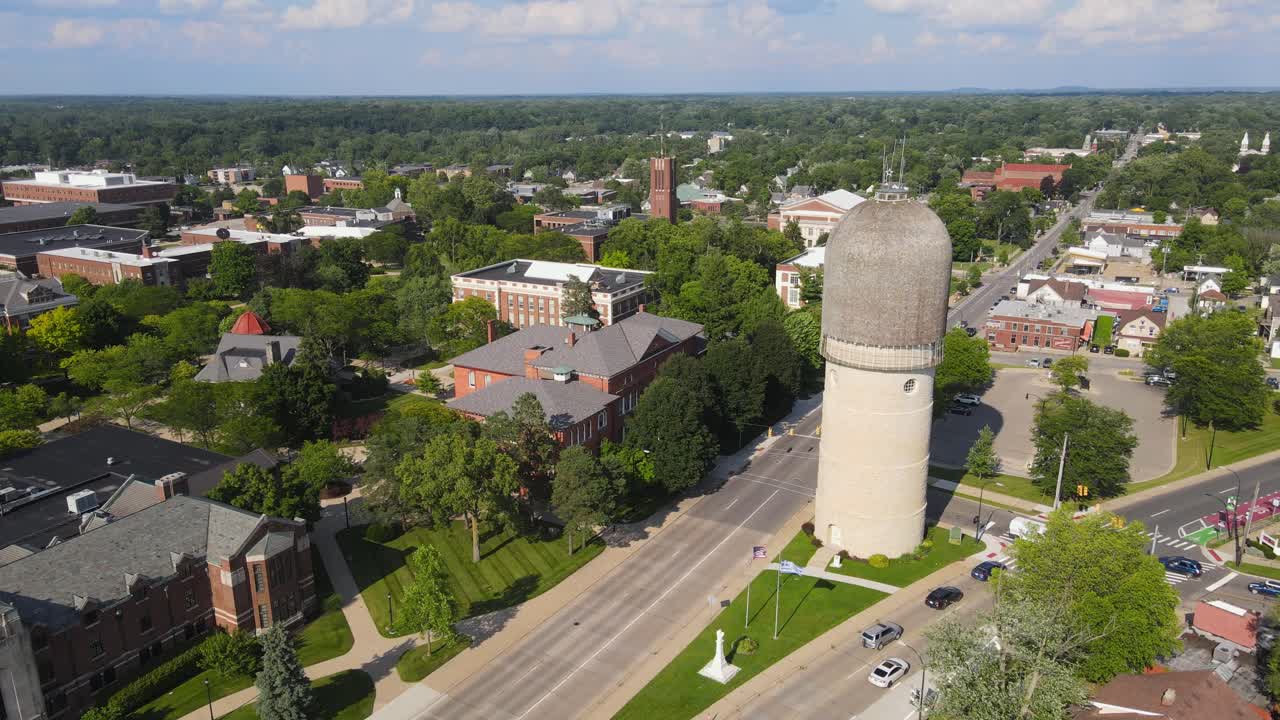 Aerial View of a Small Town with a Unique Water Tower