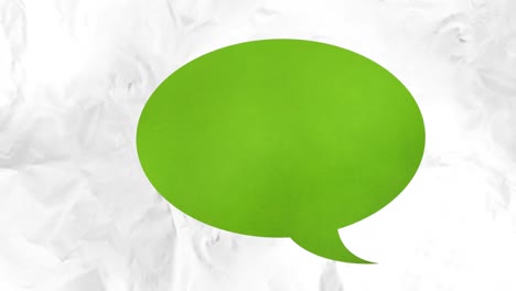 animation of green speech bubble over moving grey smudges on white background