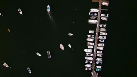 aerial top down view over yachts parked at dock near hingham sailing club