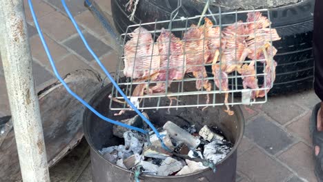 grilling seafood on a street in pattaya