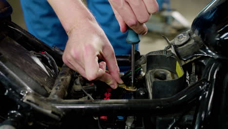 man working on a motorcycle