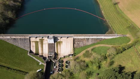 4k flying over hawkridge reservoir, drone moving forward over the water dam wall and over the reservoir, 60fps