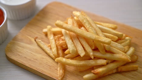 French-fries-or-potato-chips-with-sour-cream-and-ketchup