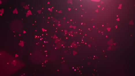 Animation-closeup-motion-small-romantic-hearts-and-glitters-on-red-Valentines-day-shiny-background