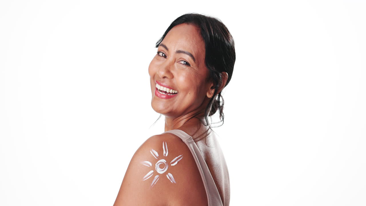 Happy Woman with Sunscreen Sun Drawn on Her Shoulder