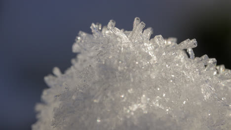 Macro-shot-of-snow-and-ice-melting-in-the-sunlight