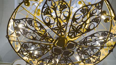 ornate gold chandelier in a church