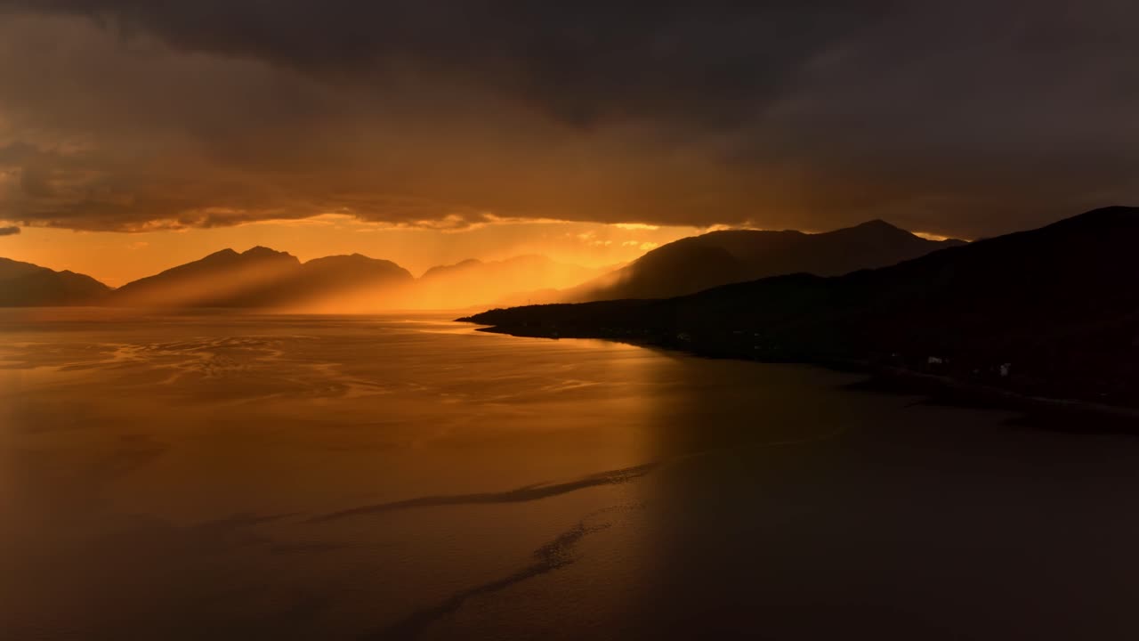 Drone footage of a stormy sunset over Loch Linnhe, from North Ballachulish, Fort William, Scotland