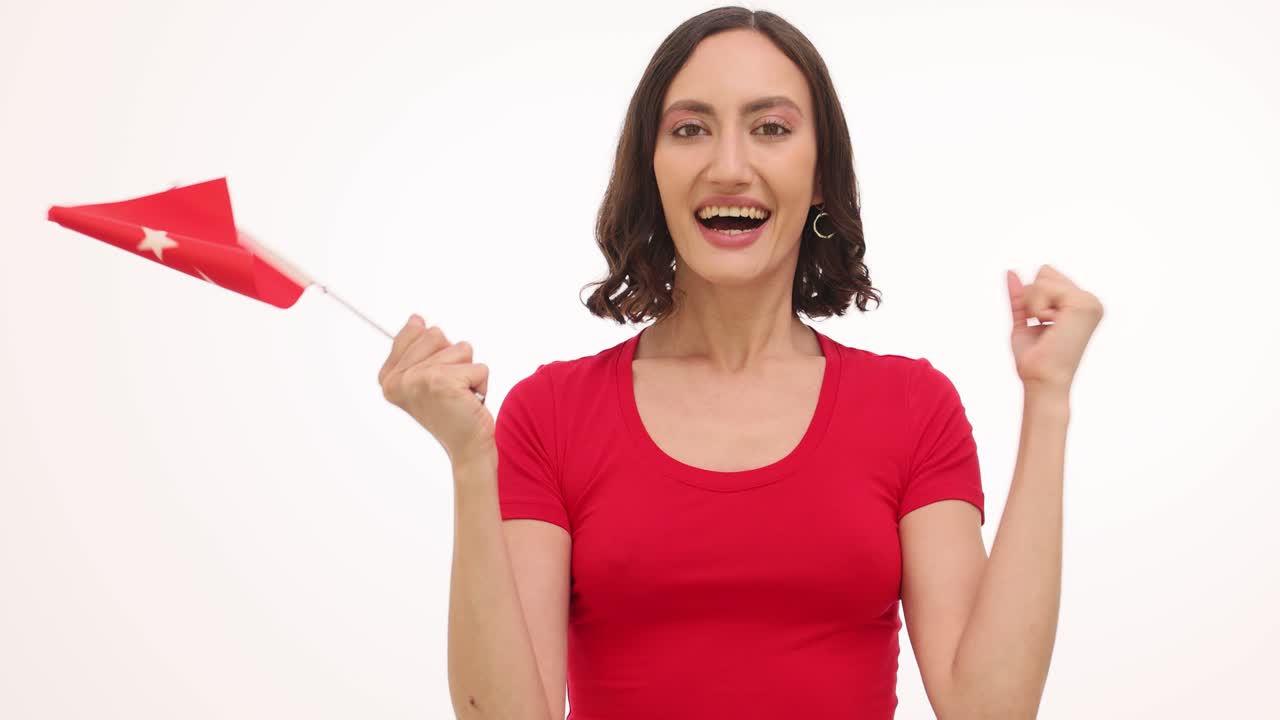 Woman celebrating with a Turkish flag