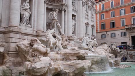 trevi fountain in rome italy flowing during the day 4k slow motion