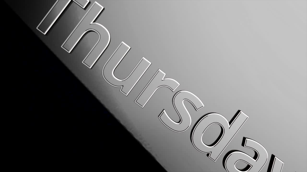 Close up view of the word Thursday on a metal surface | Premium Stock ...