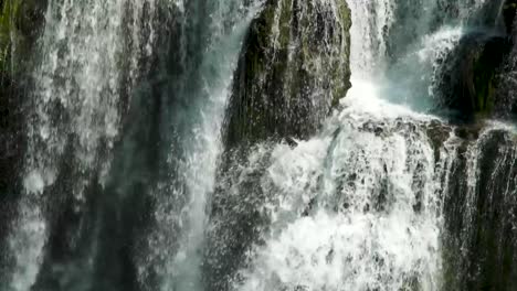 a close up of the thundering lower lewis waterfall in washington state