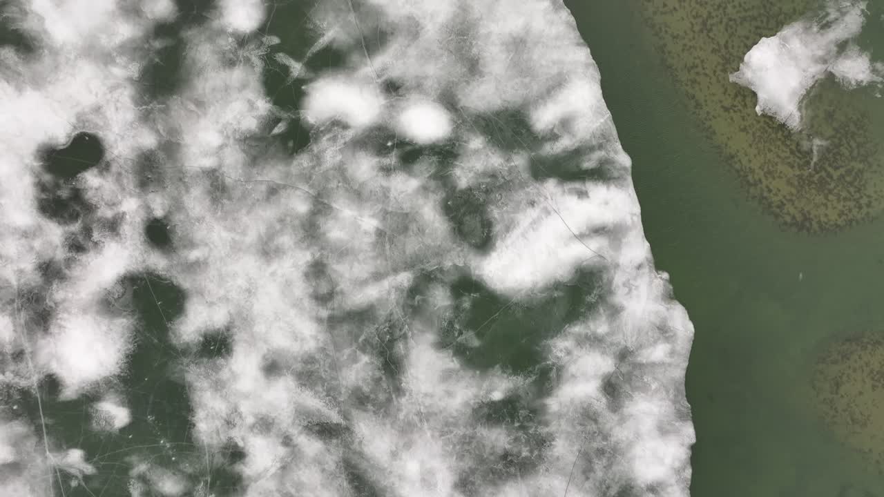 ice meets lava textures at Mývatn lake near Skútustaðir Reykjahlíð Iceland